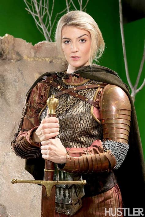 blonde female amanda tate strips off her medieval cosplay outfit