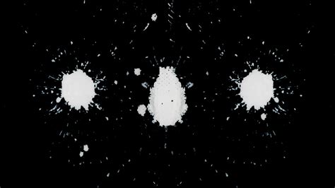 amazing abstrac white ink blots   black background top view footage