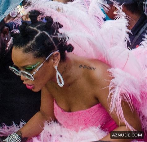 rihanna sexy in a pink dress during kadooment day parade