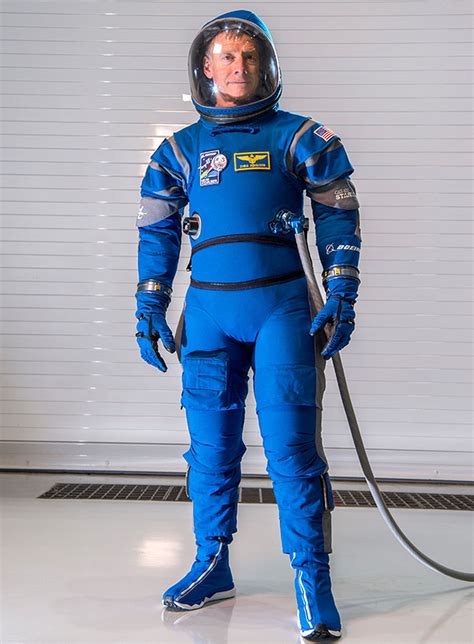 boeing unveils blue spacesuits  starliner crew capsule universe today