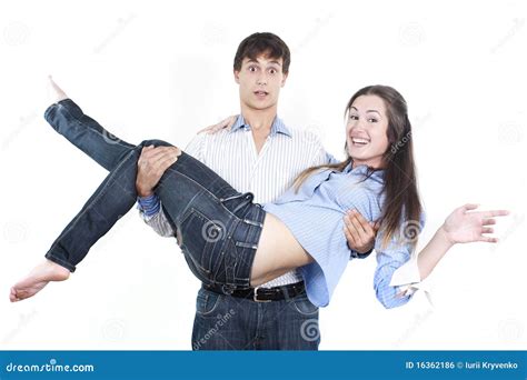 couple  love man carrying woman   arms stock photography