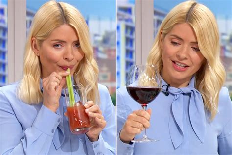 holly willoughby sucks on a celery stick as she boozes with phil