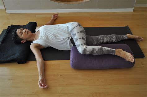 featured restorative pose supported supine twist yoga  times