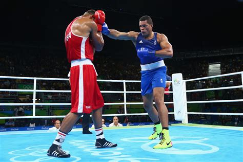olympic boxing rules scoring  judging