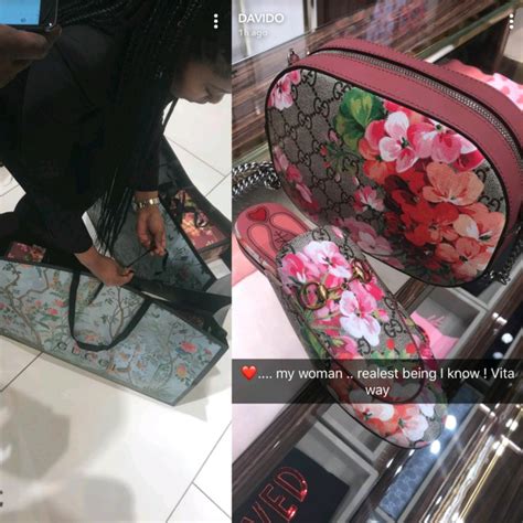davido takes his woman shopping at a gucci store photos celebrities nigeria