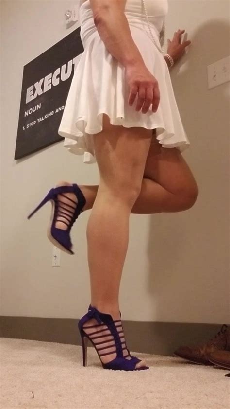 Crossdresser In Purple Shoes And Sexy White Dress Tranny