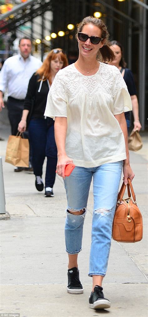 christy turlington dresses down in torn jeans and lacy in ny with gal pal daily mail online