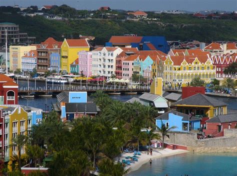 queen emma bridge  curacao willemstad wikipedia willemstad colourful buildings hotel