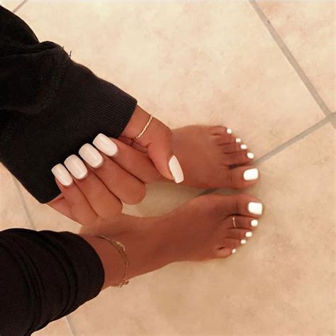 matching white hand  toe nail style white clean nail polish nail