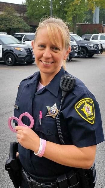 why are police adding pink to their uniforms equipment vehicles