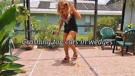 Nasty Girlfriends Crushing Toy Cars In Wedges Fast Phone