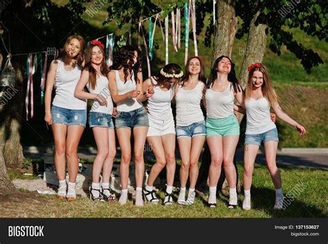 seven happy sexy girls on short image and photo bigstock