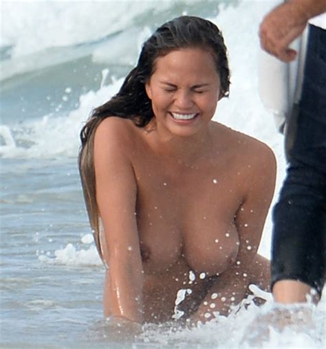 chrissy teigen nude naked boobs big tits swimming paparazzi celebrity leaks scandals leaked