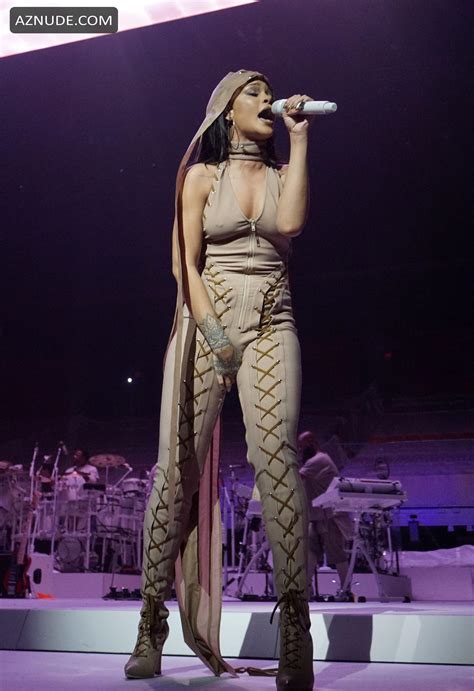 rihanna performs braless in a sheer bodysuit as part of