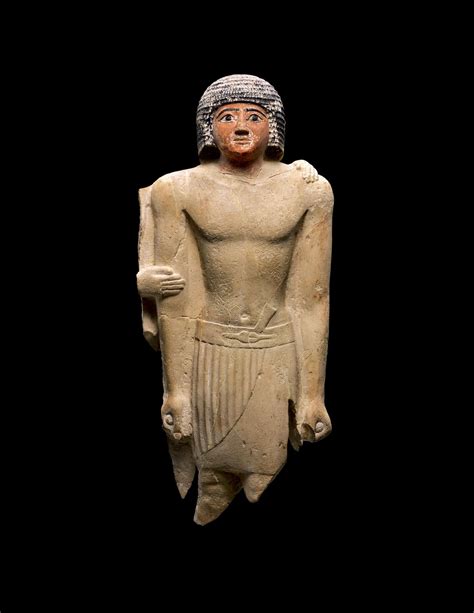 An Egyptian Limestone Figure Of A Man 5th Dynasty 2520
