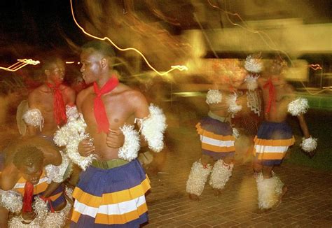 zulu dancing at night photograph by barbara magor fine art america
