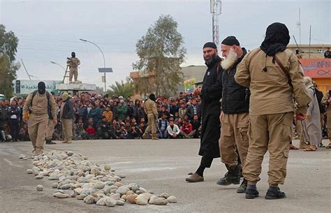 pictures isis stones to death couple accused of