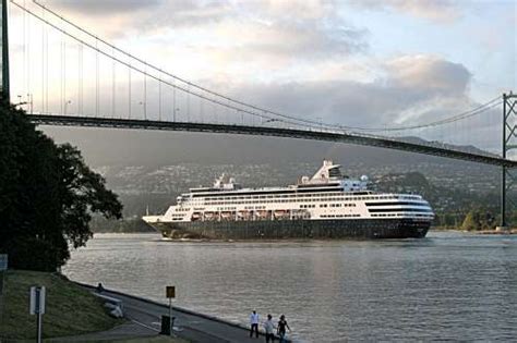 Cruise Ship Sails Under Lions Gate Bridge Vancouver At Sundown