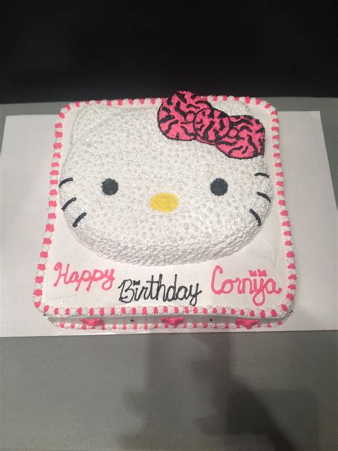 kitty birthday cake  pink  white frosting   side