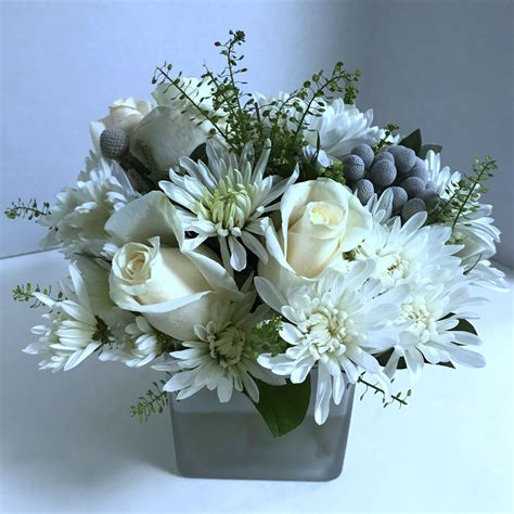 elegant white palette  flowers floral centrepieces rose