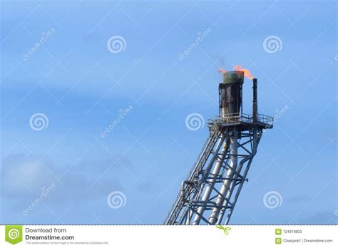 gas flare  releasing  burning   atmosphere   offshore gas platform  sky stock