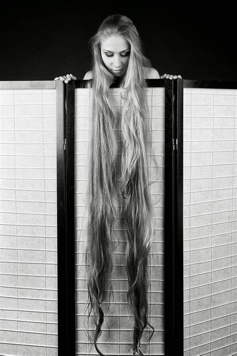 Long Hair Girl Shows Off Her Floor Length Hair