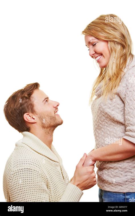 Man Asking For Apolgy From His Woman On His Knees After An Argument