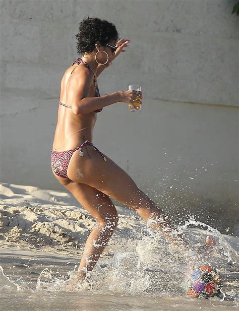 rihanna in bikini having fun on a beach in barbados pichunter