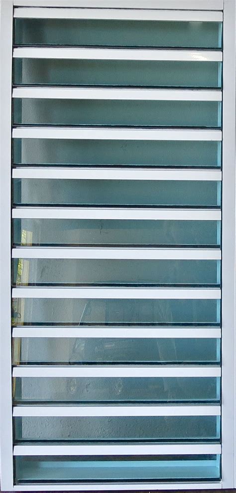 superguard security window  white aluminum  blue green glass    louver