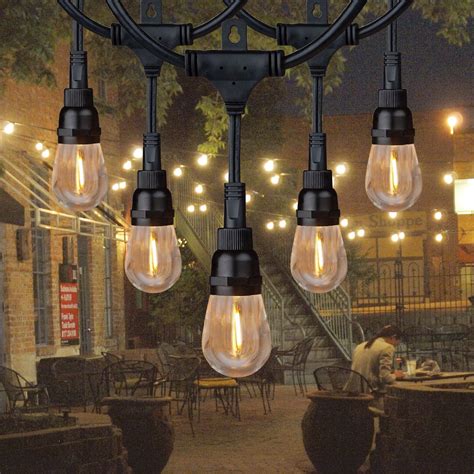 konsep outdoor cafe string lights desain cafe