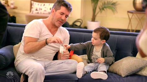 simon cowell playing with son eric will actually melt your