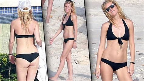 gwyneth paltrow continues to flaunt her flawless bikini bod on vacation