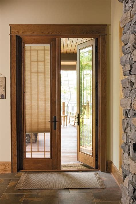 pella designer series hinged patio door   hinged patio doors patio doors french doors