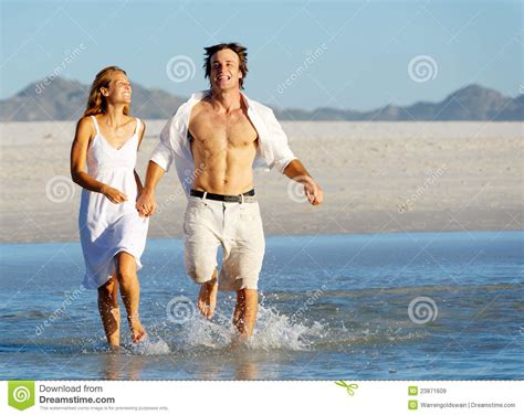 Beach Run Splash Couple Stock Image Image Of Attractive 23871609