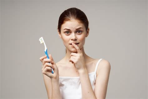 premium photo cheerful woman toothpaste brushing teeth dental health
