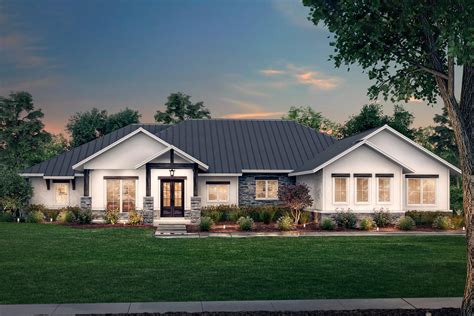 story hill country home plan  open floor plan  game room hz architectural