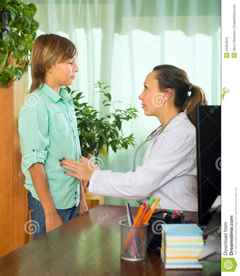 doctor with teenager patient stock image image of