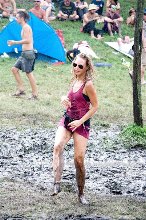 girl dancing in the mud on ozora festival editorial
