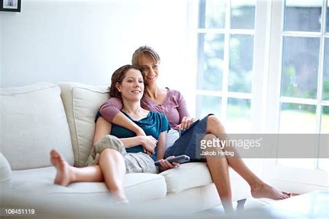 lesbian couple watching tv bildbanksfoton och bilder getty images