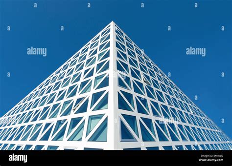detail   modern building facade  triangle shaped windows stock photo alamy