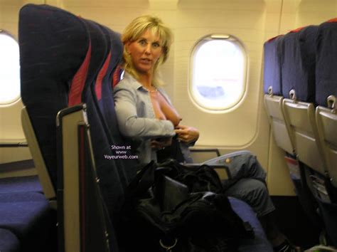wife flashing tits in airplane june 2005 voyeur web