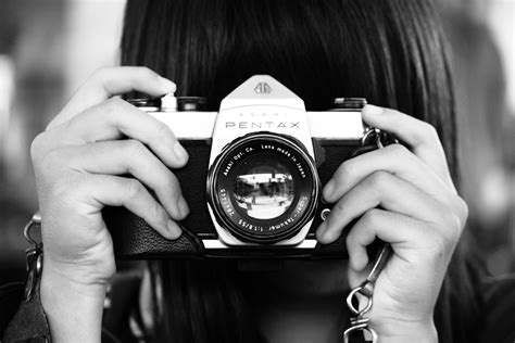 photographers shooting  pentax camera image  stock photo