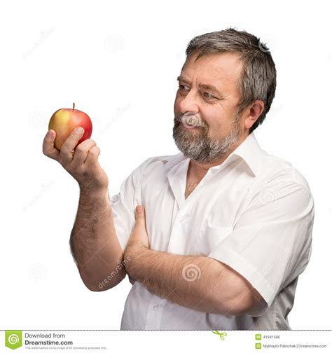 middle aged man holding  red apple stock photo image  natural blank