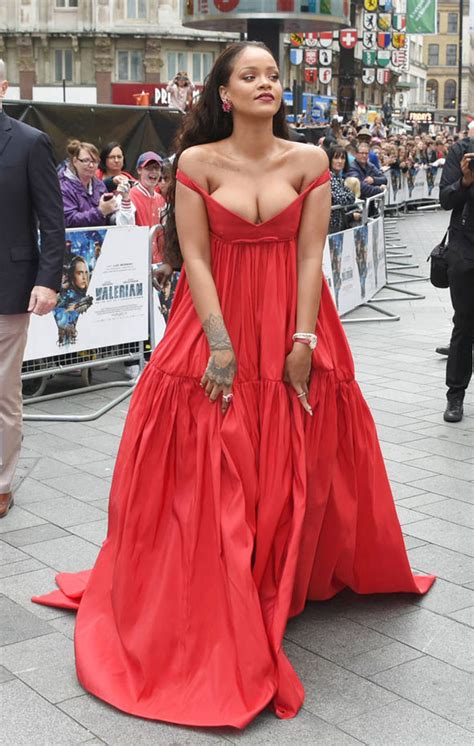rihanna s ample assets nearly spill out of risque plunging gown at valerian premiere celebrity