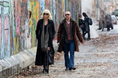 first look charlize theron kicks butt in atomic blonde