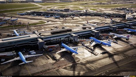 klm airport overview terminal building  amsterdam schiphol photo id  airplane