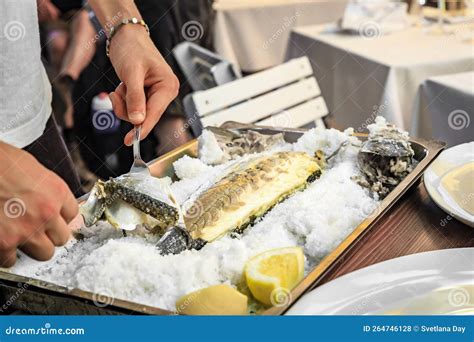 Roasted Branzino Or Sea Bass Filleted At A Table Vernazza Cinque
