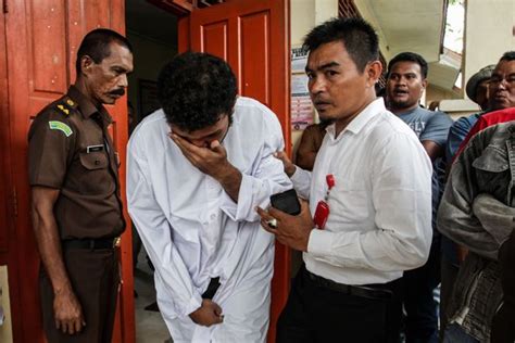 two men in indonesia publicly caned with 82 lashes for having gay sex world news mirror online