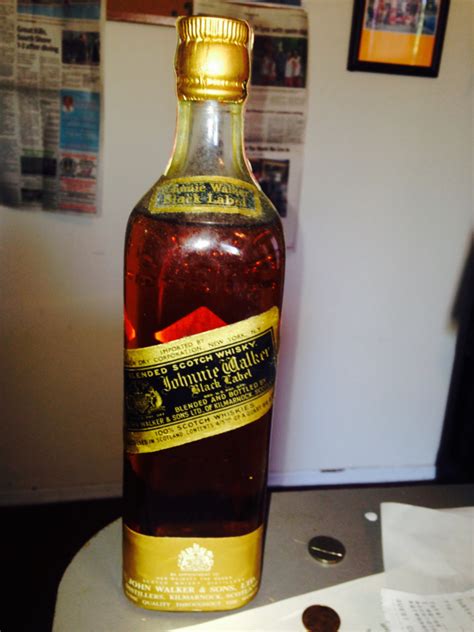 old bottle of johnnie walker black label looking to find the value of