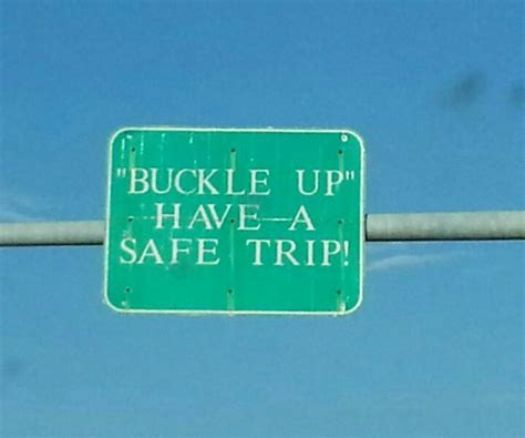 buckle up for safety have a safe trip truck driver highway signs